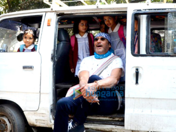 Jackie Shroff poses with school children in Bandra