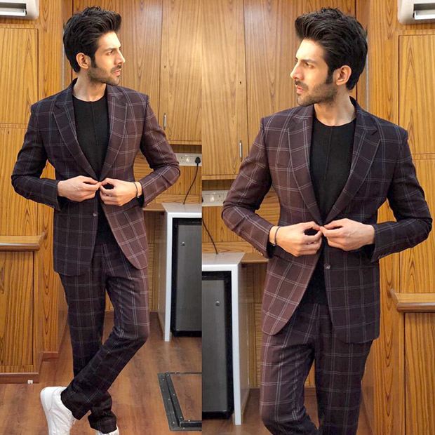Kartik Aaryan makes a dapper style statement with a checkered suit for Sonu Ke Titu Ki Sweety promotions