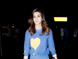 Kriti Sanon and Suniel Shetty snapped at the airport last night