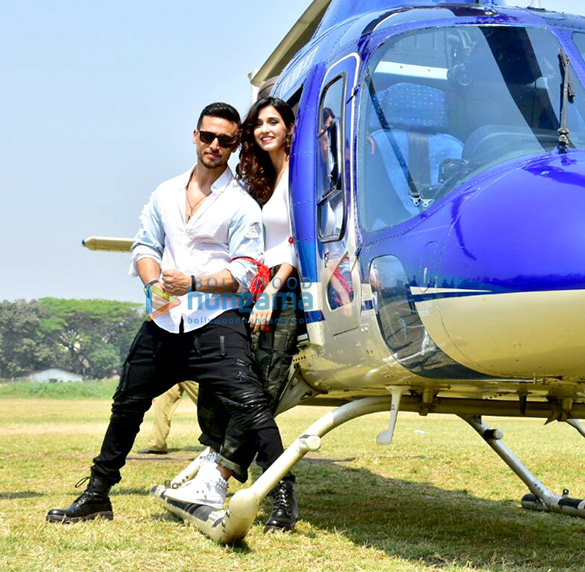 tiger shroff and disha patani arrive in a helicopter for the trailer launch of baaghi 2 2 2