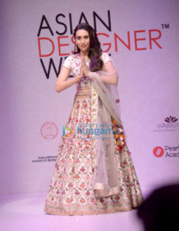 Karisma Kapoor walks the ramp for designer Priya Rout at the Asian Designer Week in New Delhi