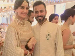 Oo La La!  Sonam Kapoor and Anand Ahuja twin in white, looking spectacular for their mehendi and sangeet ceremony