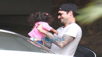 Daniel Weber and Sunny Leone snapped with their daughter at their new apartment in Juhu