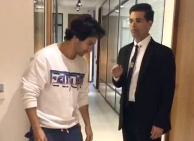 Varun Dhawan gets filmy, touches ‘GURU’ Karan Johar’s feet (see pic)
