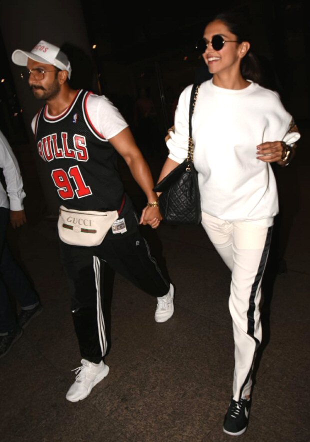 Lovebirds Ranveer Singh and Deepika Padukone are holding hands and are all smiles as they return from their vacay