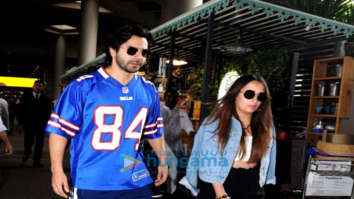 Varun Dhawan, Karan Johar and Mallika Sherawat snapped at the airport