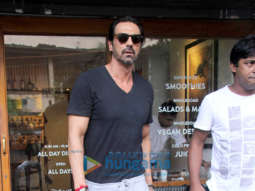 Arjun Rampal and Gabriella Demetriades spotted at Sequel Cafe in Bandra