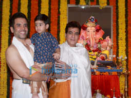 Jeetendra and Tusshar Kapoor snapped during Ganpati puja at their residence