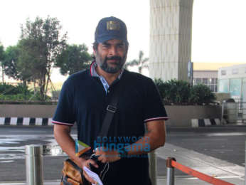 Kanika Kapoor and R Madhavan snapped at the airport