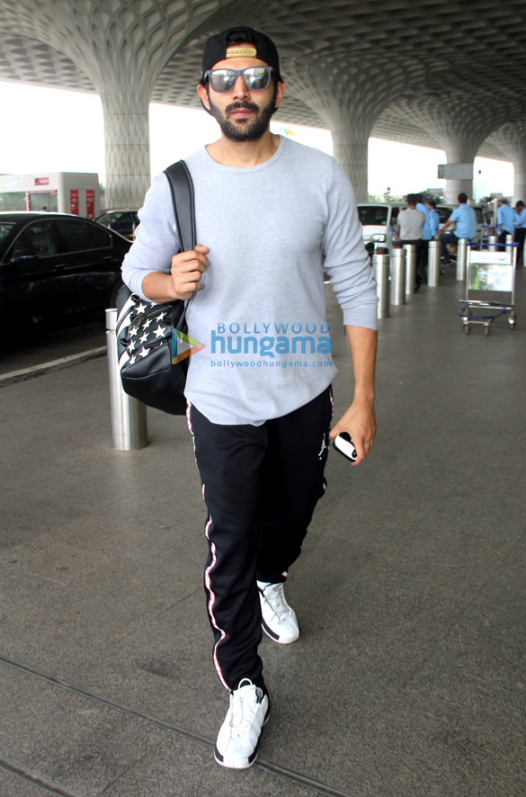 kartik aaryan rohit shetty and vedhika kumar snapped at the airport 4