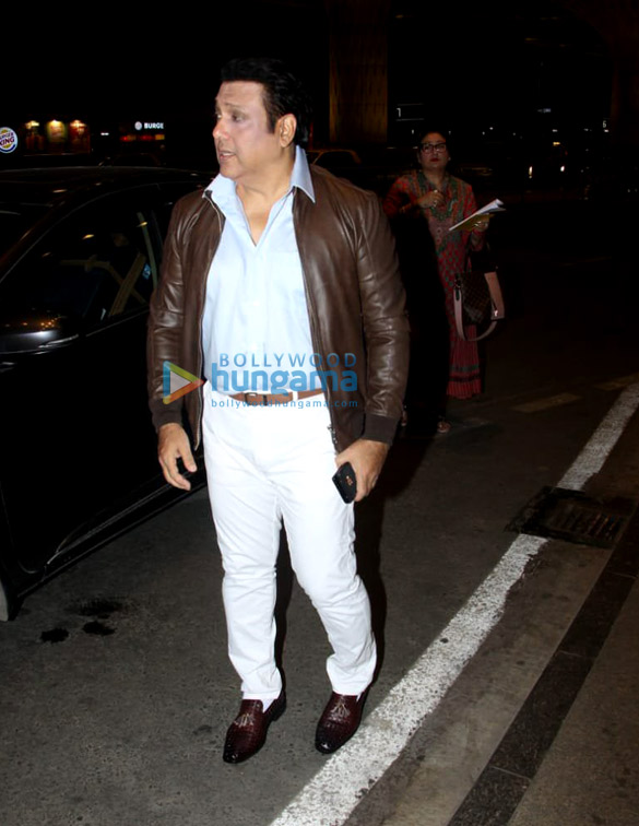govinda snapped with his wife at the airport 6