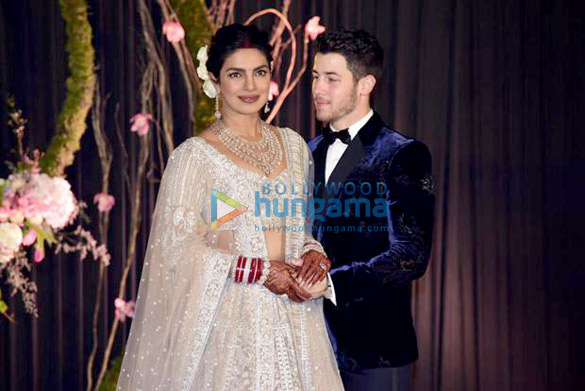 priyanka chopra and nick jonas along with their families snapped at their delhi reception 16