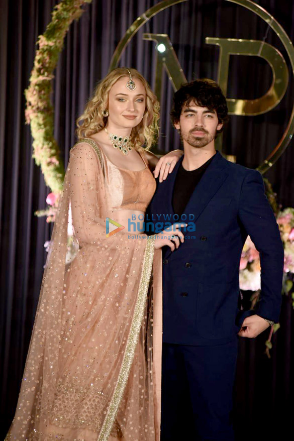 priyanka chopra and nick jonas along with their families snapped at their delhi reception 18
