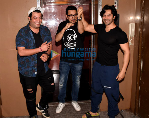 varun dhawan dinesh vijan and varun sharma spotted at a movie screening 1