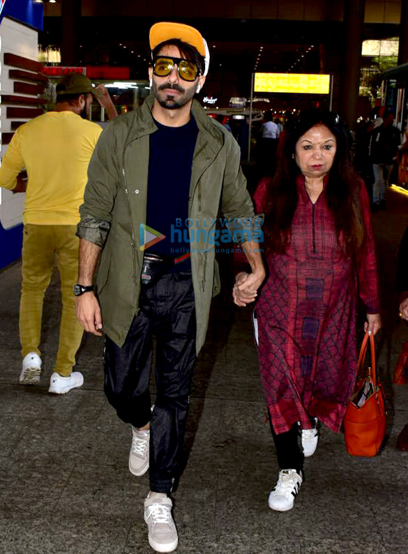 anupam kher and aparshakti khurana snapped at the airport 4