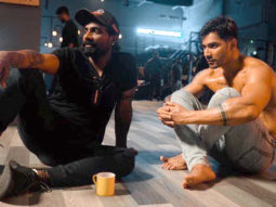 Remo D’souza and a shirtless Varun Dhawan look lost in an intense discussion in this behind-the-scenes picture from Street Dancer 3D