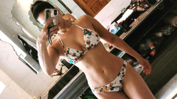 HOT! Sunny Leone gets all set for a swim in her sexy floral bikini in Jaipur!