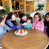Kareena Kapoor is all smiles as Karisma Kapoor feeds cake to Taimur Ali Khan in this cutest picture ever