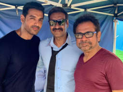 Anees Bazmee strikes a pose with his first hero and latest hero Ajay Devgn and John Abraham on the sets of Pagalpanti