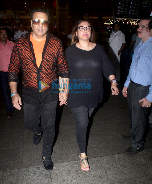 photos malaika arora and govinda snapped at the airport 4