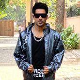 Varun Dhawan dons a metallic track suit along with retro shades just when he thought he couldn’t look more dapper!