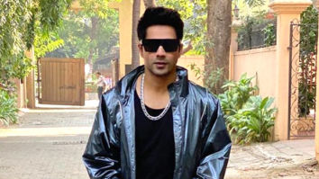 Varun Dhawan dons a metallic track suit along with retro shades just when he thought he couldn’t look more dapper!