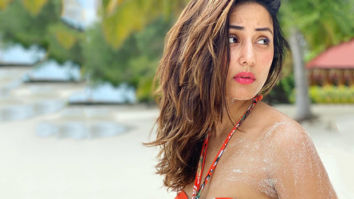Hina Khan flaunts her perfect body in an orange BIKINI by the beach in Maldives