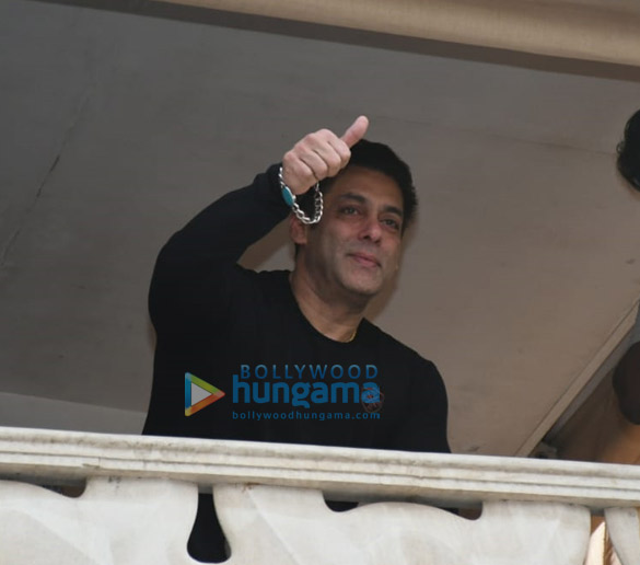 photos salman khan greets fans from his residence in bandra 2