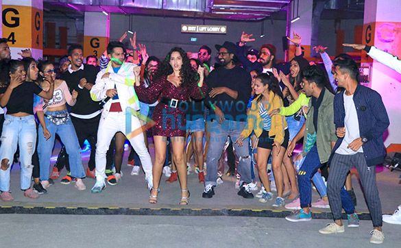 photos varun dhawan nora fatehi and remo dsouza grace the song launch of garmi from their film street dancer 3d 2