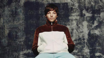 Louis Tomlinson reveals tracklist of his album Walls through a mural painting in London