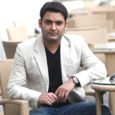Kapil Sharma is a pro guitarist in this video as his teammates enjoy the music