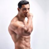 HOT! John Abraham poses shirtless in just a towel for Dabboo Ratnani’s calendar shoot