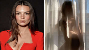 Emily Ratajkowski poses nude behind a semi-sheer curtain while self-isolating amid coronavirus pandemic
