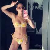 Halsey flaunts her eviable toned body in a yellow bikini, sings 'Canyon Moon' by Harry Styles amid self-quarantine period