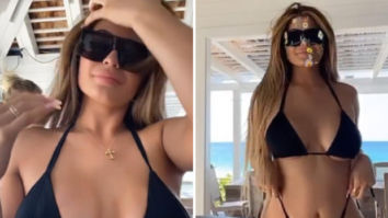 Kylie Jenner sets the temperature soaring in tiny black bikini during her vacation in Bahamas