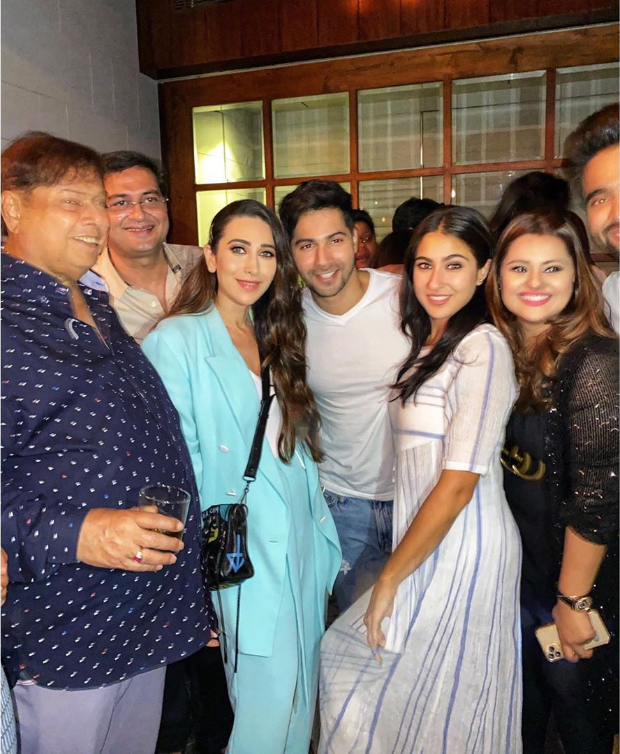Varun Dhawan and Sara Ali Khan strike a pose with original Coolie No 1 girl Karisma Kapoor at wrap up party Varun Dhawan and Sara Ali Khan strike a pose with original Coolie No 1 girl Karisma Kapoor at wrap up party