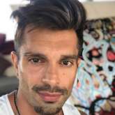 Karan Singh Grover puts soil to its maximum use, flaunts his physique as he works out shirtless