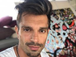 Karan Singh Grover puts soil to its maximum use, flaunts his physique as he works out shirtless