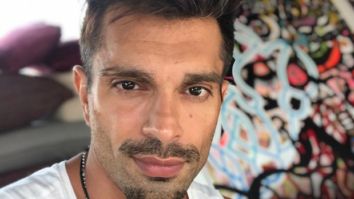 Karan Singh Grover puts soil to its maximum use, flaunts his physique as he works out shirtless