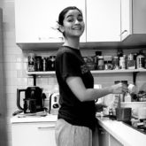 Alia Bhatt grins as she gets clicked while making a pudding