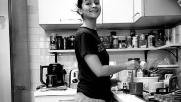Alia Bhatt grins as she gets clicked while making a pudding