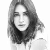 Kriti Sanon shares a monochrome picture, calls herself old school for penning things she loves