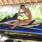 Throwback Thursday: Disha Patani looks smokin' hot in this tiny white bikini while posing on jet ski