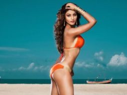 Urvashi Rautela seems to miss the beach life, shares picture posing in an orange bikini
