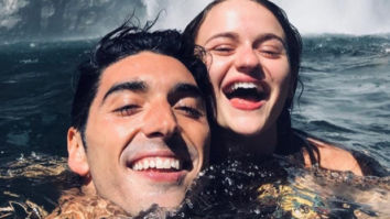 The Kissing Booth 2 stars Joey King and Taylor Zakhar Perez swim under a waterfall during their getaway with friends
