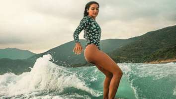Lisa Haydon sizzles in printed swimsuit as she goes surfing in Hong Kong
