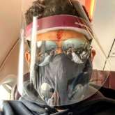 Abhishek Bachchan commences another schedule for Bob Biswas in Kolkata, shares flight picture wearing a face shield