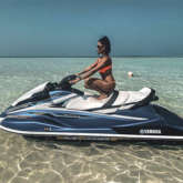 Shibani Dandekar soaks up in the sun in orange bikini while sitting on a jet-ski in Maldives