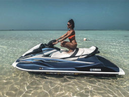 Shibani Dandekar soaks up in the sun in orange bikini while sitting on a jet-ski in Maldives
