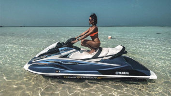 Shibani Dandekar soaks up in the sun in orange bikini while sitting on a jet-ski in Maldives